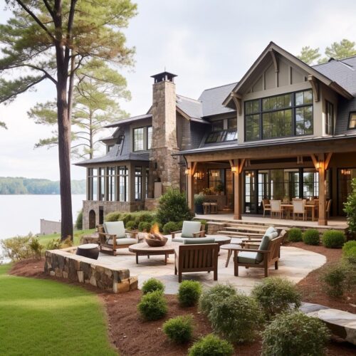 A modern stone lake house with views.